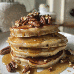 Maple Pecan Pancakes with Bourbon Vanilla Drizzle — chef-tested restaurant-quality photo