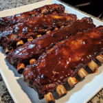 How to make Smoky Bourbon BBQ Ribs with Sweet Heat Glaze — key cooking step