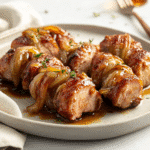 How to make Melty Onion Pork Loin Twists With Bourbon Drizzle — key cooking step
