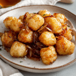 How to make Savory Honey Tater Tot Skillet Bombs With Onion Crunch — key cooking step